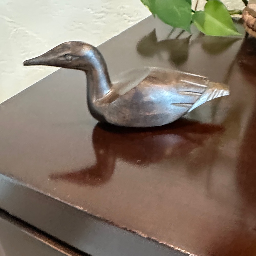 Elegant Handcarved Duck Sculpture